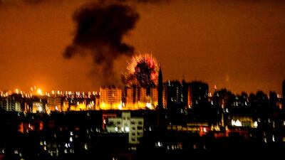 An explosion in Gaza City after an airstrike by Israeli forces on June 18. Israeli aircraft pounded more than a dozen militant targets in Gaza. AFP