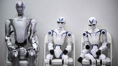 Robots from Unitree Robotics take a seat at the VivaTech technology startups and innovation fair at the Paris Expo Porte de Versailles, in France. AFP