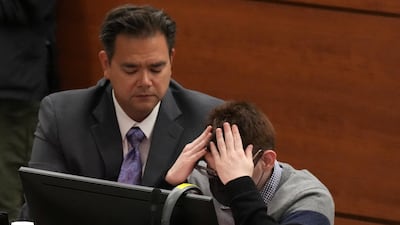 Marjory Stoneman Douglas High School shooter Nikolas Cruz looks down as video and audio from inside a classroom during the rampage are played to the court in Florida. Reuters