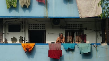 A resident watches as US Secretary of State Marco Rubio's motorcade heads towards the Mother Teresa House of the Missionaries of Charity, in Kolkata, India, on May 23, 2026. Reuters