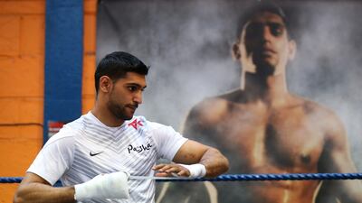 Amir Khan has not been in a ring since his sixth round knockout by Saul 'Canelo' Avarez in May. Alex Livesey / Getty Images