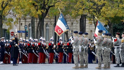 Troops from the Commandos Parachutistes de l'Air at the Tomb of the Unknown Soldier at the Arc de Triomphe in Paris as part of commemorations marking the 105th anniversary of the November 11, 1918 Armistice that ended the First World War. AFP