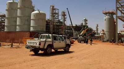 Algerian troops have the site surrounded, deep in the desert. An unidentified hostage who spoke to France 24 television said prisoners were being forced to wear explosive belts.