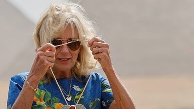 The first lady wears a souvenir at the end of her visit to the Giza Pyramids necropolis on the outskirts of Cairo, Egypt. EPA