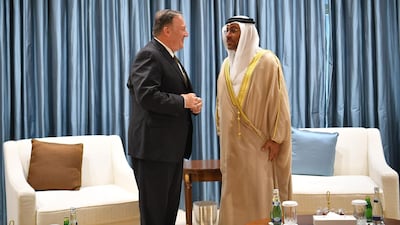 US Secretary of State Mike Pompeo talks to United Arab Emirates Minister of State Ahmed al-Sayegh upon his arrival at al-Bateen Air Base in Abu Dhabi on September 19, 2019. AFP