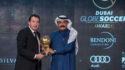 Marc Wilmots of Belgium shown being awarded 'Best Coach of the Year' on Sunday at the Globe Soccer Awards in Dubai. AFP Photo