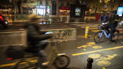 Cyclists on a 'coronapiste', a temporary cycle path created during the pandemic in Paris, France. Mayor of Paris Anne Hidalgo set up about 60 kilometres of new cycling roads to take pressure off public transport during the pandemic. AFP