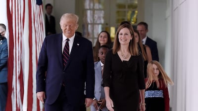 US President Donald Trump and Judge Amy Coney Barrett, arrive at the Rose Garden of the White House in Washington. AFP