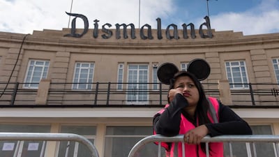 A steward is seen outside Bansky's 'Dismaland' exhibition, which opened recently at a derelict seafront lido in Weston-Super-Mare, England. Matthew Horwood / Getty Images