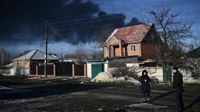 Black smoke rises from a military airport in Chuguyev near Kharkiv. AFP