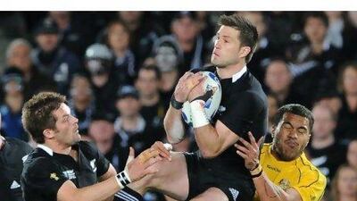 Cory Jane, centre, caught every high ball Australia kicked his way as New Zealand dominated every aspect of their semi-final victory. William West / AFP