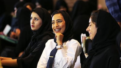 Muna Hadharem, centre, is one of five female Emirati engineers employed by Etihad Airways. Her success, and that of the other 1,268 women at the airline – including call centre agent Haya Ahbabi, left, and cargo ramp manager Aala Alrahma – was yesterday the topic for a panel discussion to mark Friday’s Emirati Women’s Day, at Etihad’s training academy in Abu Dhabi. Pawan Singh / The National