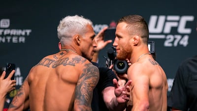 May 6, 2022; Phoenix, Arizona, USA; UFC fighter Charles Oliveira (left) faces off with Justin Gaethje during weigh ins for UFC 274 at the Arizona Federal Theatre. Mandatory Credit: Mark J. Rebilas-USA TODAY Sports