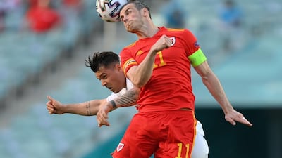 Wales' Gareth Bale in action with Switzerland's Granit Xhaka. Reuters