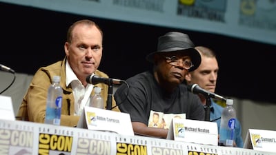Michael Keaton, left, Samuel L. Jackson, centre, and Joel Kinnaman attend the RoboCop panel on Day 3 of Comic-Con International. Jordan Strauss / Invision / AP