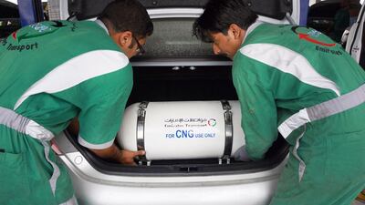 A CNG tank is installed in a vehicle at a conversion station in Khalifa City. DELORES JOHNSON / The National
