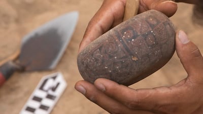 A decorated calabash found at the Cajamarquilla archaeological complex in Peru. AFP