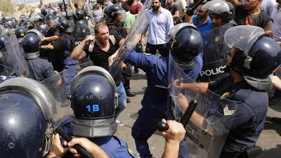 Lebanese activists from the 'YouStink' campaign clash with riot police after a protest on September 16. AFP
