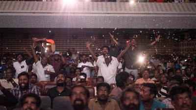 Fans celebrate as they watch Jailer in Chennai, Tamil Nadu. EPA