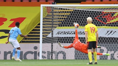 Ben Foster saves Raheem Sterling's penalty, only for the City star to score from the rebound. AFP