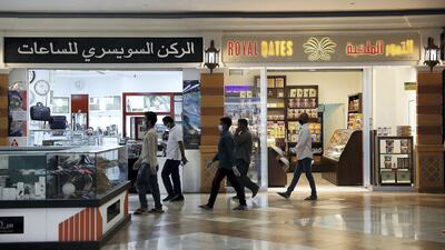 Visitors must wear protective masks and gloves and are encouraged to bring their own bags. Pawan Singh / The National