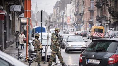 Belgian soldiers patrol in the Schaarbeek district of Brussels, Belgium, on March 23, 2016. Security services are on high alert following the previous day’s deadly explosions in the departure hall of Zaventem Airport and on the metro system in Brussels, Belgium. SIL has claimed responsibility for the attacks. Christophe Petit Tesson / EPA
