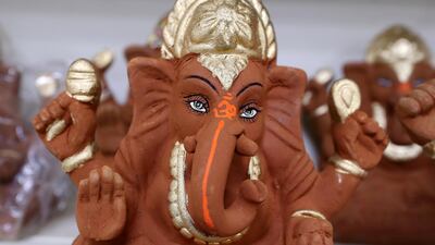 Eco-friendly Ganesh idols made of clay on display at Madhoor store in Bur Dubai. These Ganesh statues can be immersed at home as part of the ritual observed during the festival. Pawan Singh / The National