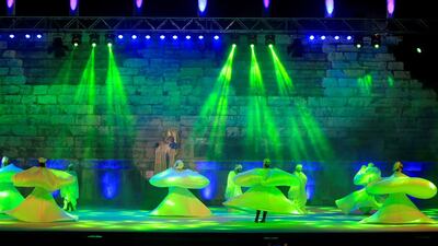 Members of Enana Dance Theatre perform on stage during the opening of Tyre International Festival in Tyre, Lebanon. Ali Hashisho / Reuters
