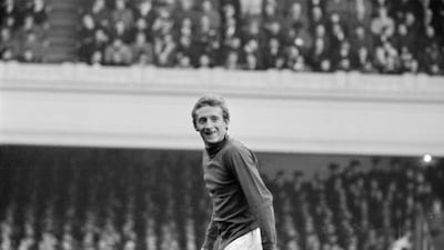 Denis Law during the Arsenal-Manchester United match at Highbury in 1964. Getty