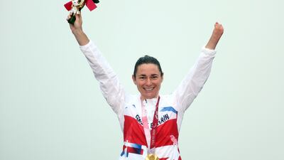 Gold medallist Sarah Storey of Britain celebrates on the podium after winning the women's C4-5 Road Race. Reuters