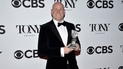 Chris Harper with his award for Best Revival of a Musical for 'Company'. AP