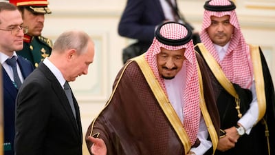 Saudi Arabia's King Salman welcomes Russian President Vladimir Putin during their meeting in Riyadh, Saudi Arabia. AFP