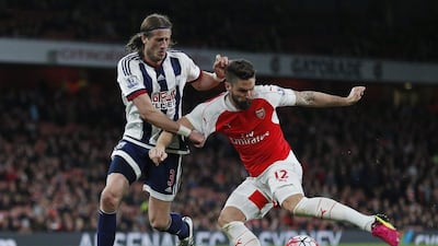 West Brom’s Jonas Olsson and Arsenal’s Olivier Giroud in action. Eddie Keogh / Reuters