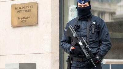 A policeman guards the Belgian Federal Prosecutor's office in Brussels on January 16, 2015. Geert Vanden Wijngaert/AP Photo