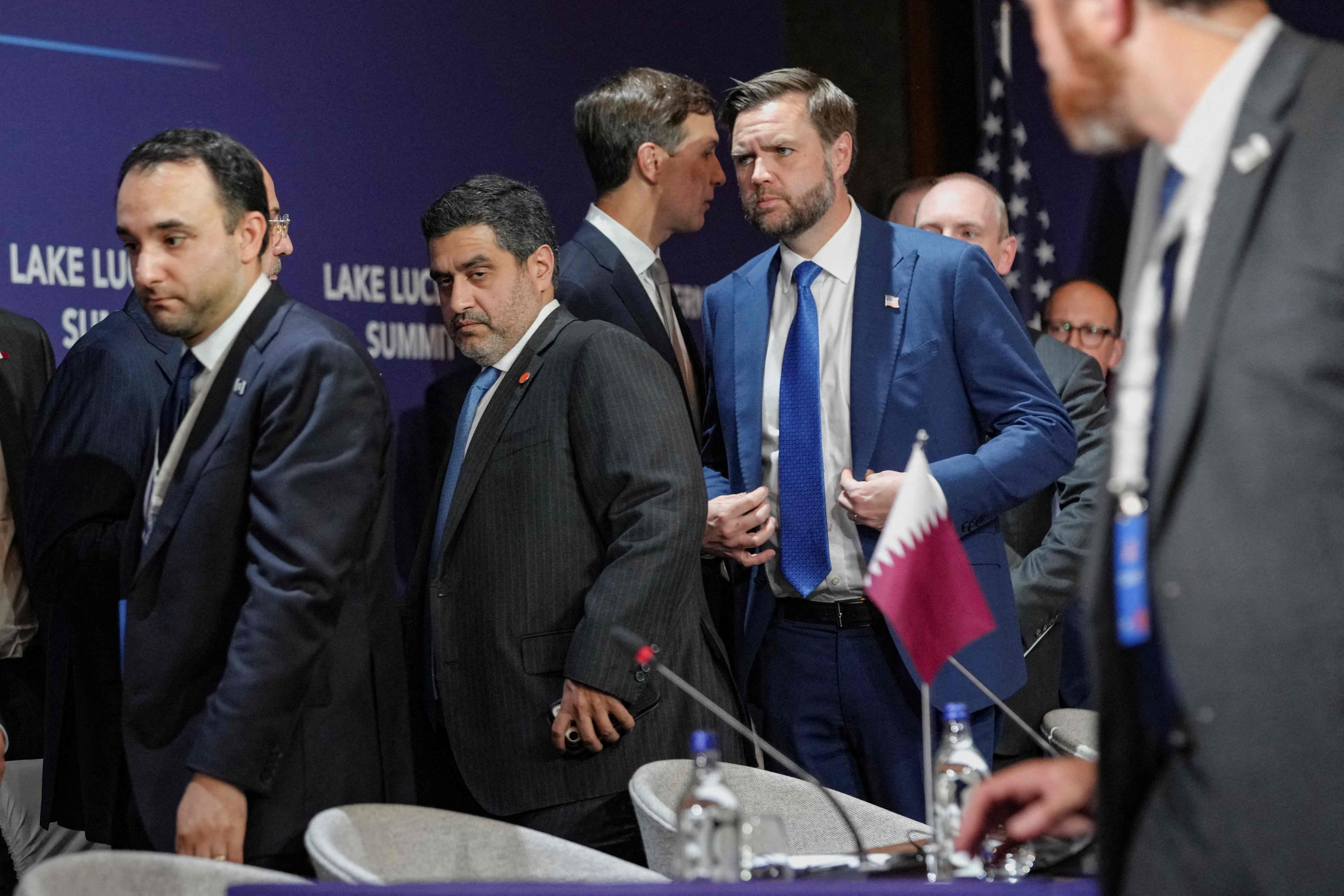 JD Vance listens to Jared Kushner. AFP