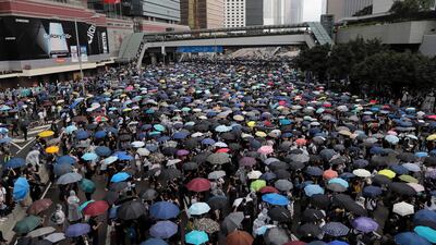 Protesters gather near the Legislative Council. AP