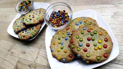 Cookies made with natural colours, right, and ones made with artificial colours at a Panera Bread store in New York. Mary Altaffer / AP Photo