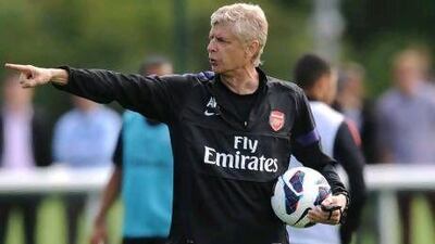 Arsene Wenger wants Arsenal to stick to their passing principles. Stuart MacFarlane / Getty Images