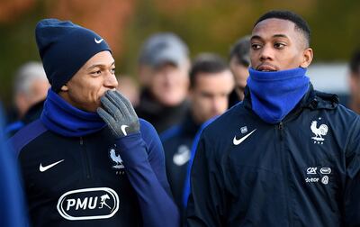 David Ginola describes current France international Anthony Martial, right, as "amazing", but warned there is "so much pressure" when you play for a big club like Manchester United. Franck Fife / AFP