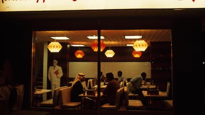 This evocative photograph shows the Kentucky Fried Chicken on Airport Road near Al Bateen Ariport at the time of its opening in 1975. The first in Abu Dhabi, it is still serving meals today. Winfield Parks / National Geographic / Getty Images