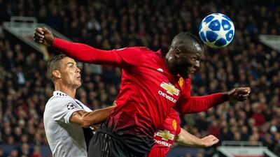 Juventus' Cristiano Ronaldo, left, in action with Manchester United's Romelu Lukaku. EPA