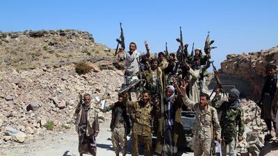 Yemeni pro-government fighters celebrate gains against Houthi rebels in Al Selw district of Taez on January 30, 2018. Reuters