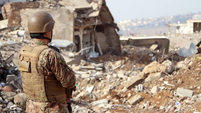 A Lebanese soldier looks on in the southern Lebanese village of Khiam. AFP