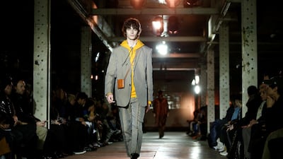 Qasimi returns to the London runway with a single breasted suit worn with a hoodie for Autumn/Winter 2020. Reuters