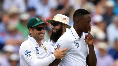 South Africa's Kagiso Rabada, right, celebrates taking the wicket of England's Ben Stokes during Day 4 of the first Test at Lord's. Nigel French / Press Association