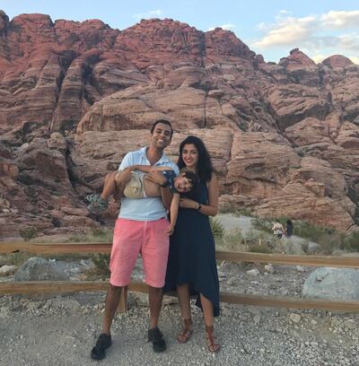 AJ Ratani and Natasha Sandhir and three-year-old son Aarav pose in front of Red Rock Canyon, Las Vegas. Courtesy 2idiotstravel.com