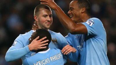 Michael Johnson, formerly of Manchester City, shown here celebrating with teammates after scoring a goal in 2009, was released by the club in December.