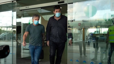 Jorge Messi (L) arrives at El Prat Airport in Barcelona. EPA