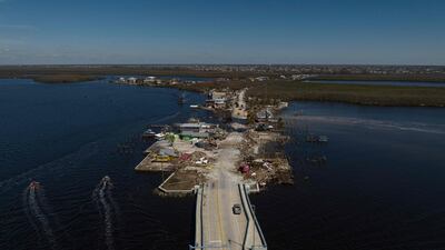 Residents are being encouraged to leave because the only road on to the island was made impassable, and electricity and water were cut by Hurricane Ian. AFP
