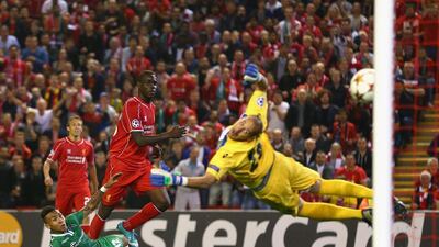 Mario Balotelli of Liverpool scores the opening goal past Milan Borjan of Ludogorets Razgrad during the Uefa Champions League on Tuesday. Liverpool won 2-1. Clive Brunskill / Getty Images